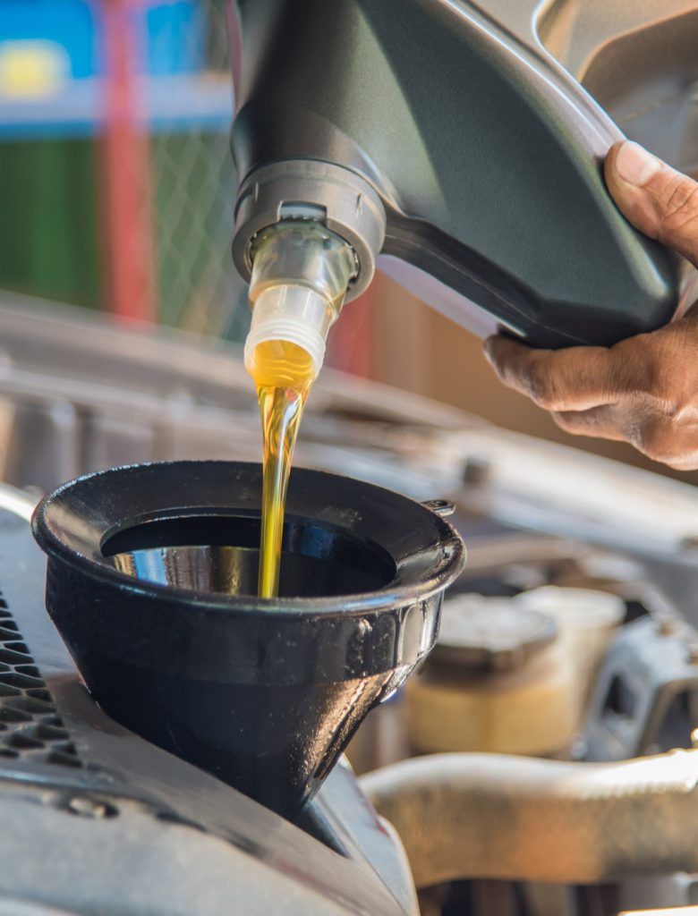 Engine being poured into a vehicle - All Makes & Models Servicing